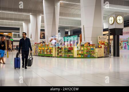 India, New Delhi, transport, Indira Gandhi, International Airport, passengers passing airside Departure Lounge shops Stock Photo