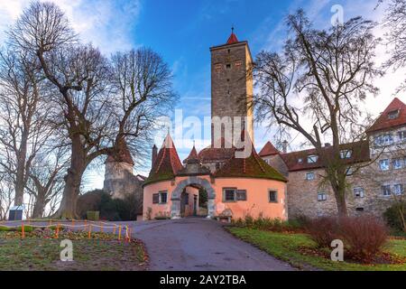 Western town gate and tower Burgturm and Stadttor in medieval Old Town of Rothenburg ob der Tauber, Bavaria, southern Germany Stock Photo