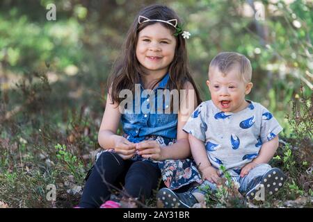 Brother and sister together Stock Photo