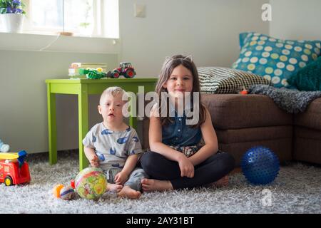 Brother and sister together Stock Photo