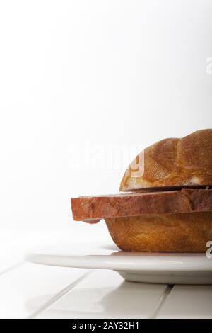 Bavarian Leberkäse in a bread roll Stock Photo