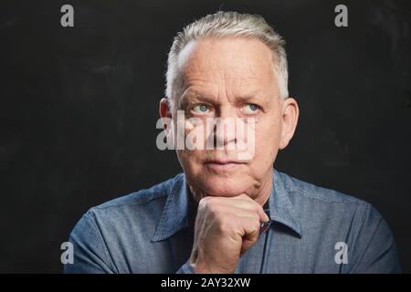 Mature man looking away Stock Photo