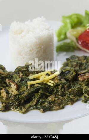 Indian spinach curry with basmati rice Stock Photo