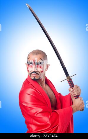 Man with sword isolated on white Stock Photo