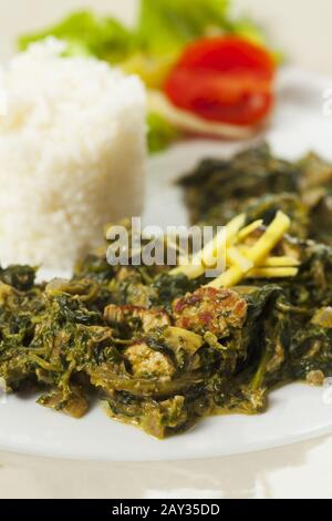 Indian spinach curry with basmati rice Stock Photo