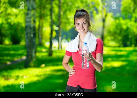 Young woman drinking water Stock Photo