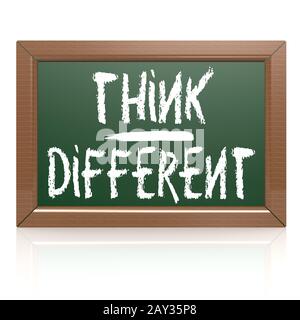 Think Different written with chalk on blackboard Stock Photo