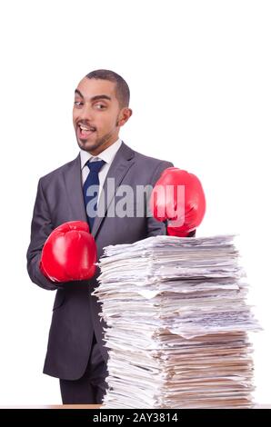 Angry businessman with stack of papers Stock Photo