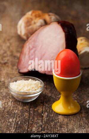 Easter egg and ham on wood Stock Photo