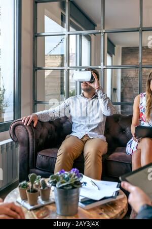 Man using virtual reality glasses Stock Photo