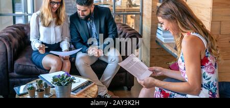 Businesspeople having an informal work meeting Stock Photo