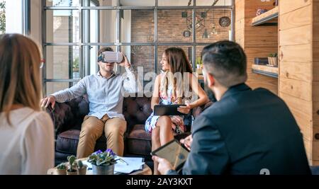 Businessman using virtual reality glasses Stock Photo