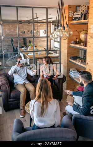 Businessman using virtual reality glasses Stock Photo