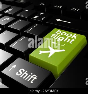 Book flight on green keyboard Stock Photo