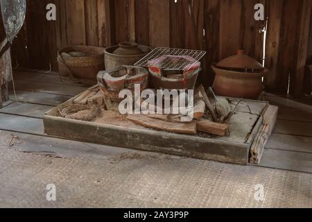 charcoal stove kitchenware in traditional old vintage kitchen in Thailand Stock Photo