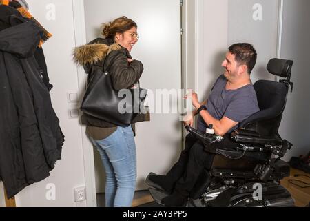 Mother talking with adult son Stock Photo