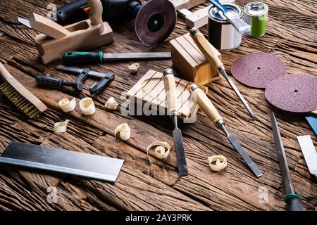 Various Carpenter Tools From Toolkit Laying On Desk Stock Photo