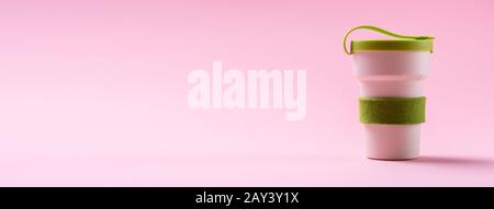 Photo Of Reusable Coffee Cup On Pink Background Stock Photo