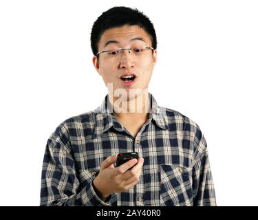 young man surprise by phone Stock Photo