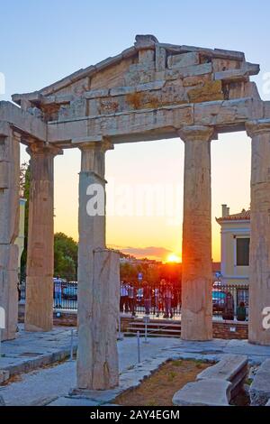 Athens, Greece  - September 21, 2019:  The Gate of Athena Archegetis at Roman Forum in Athens at sunset Stock Photo