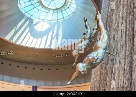 Dubai, UAE - January 30, 2020: The Divers at Dubai Mall Waterfall Stock Photo