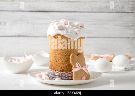 Easter cake on a white wooden background, Easter eggs, Easter cookies Stock Photo