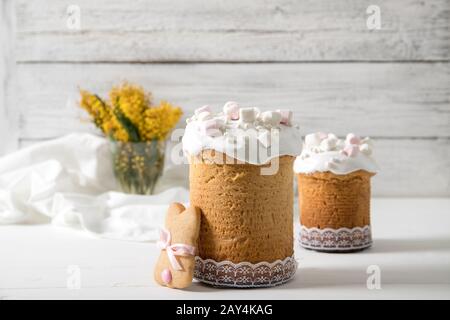 Easter cake on a white wooden background, Mimosa, Easter cookies Stock Photo