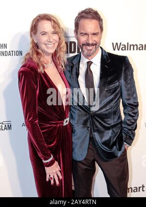 Eric McCormack (right) and Janet Holden attending the Elton John AIDS Foundation Viewing Party held at West Hollywood Park, Los Angeles, California, USA. PA Photo. Picture date: Sunday February 9, 2020. See PA story SHOWBIZ Oscars Parties. Photo credit should read: PA Wire Stock Photo