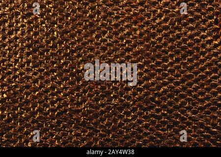 Copper gold texture metallic foil paper shiny dark orange background for wallpaper decoration element. Stock Photo