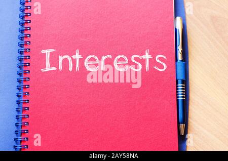 Interests write on notebook Stock Photo