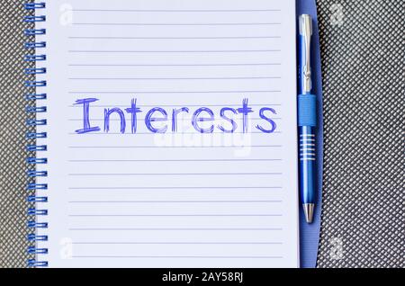 Interests write on notebook Stock Photo