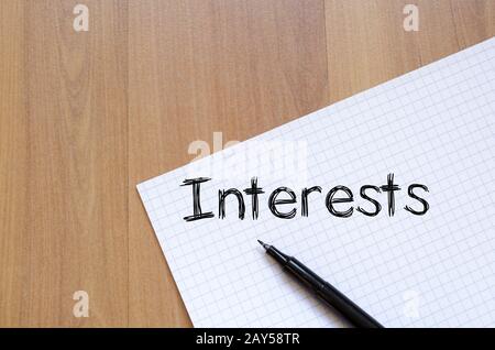 Interests write on notebook Stock Photo