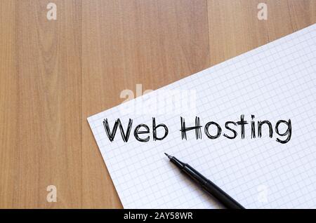Web hosting write on notebook Stock Photo
