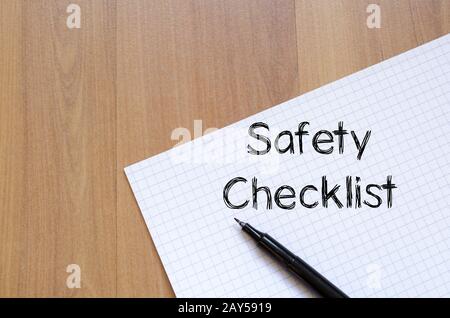 Safety checklist write on notebook Stock Photo