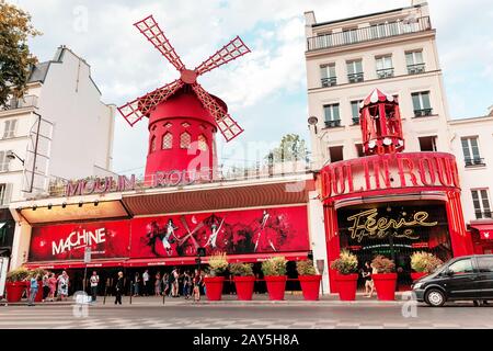 25 July 2019, Paris, France: Famous tourist landmark - Moulin Rouge cabaret exterior view Stock Photo