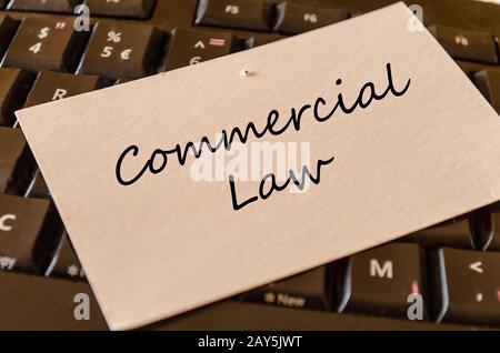 Commercial law - note on keyboard in the office Stock Photo
