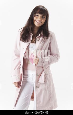 young woman in a coat on white Stock Photo