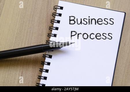 Business process write on notebook Stock Photo