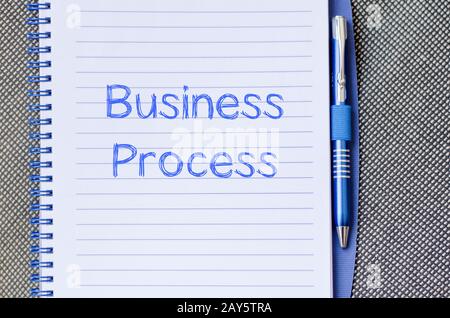 Business process write on notebook Stock Photo