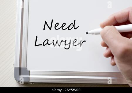 Need lawyer written on whiteboard Stock Photo