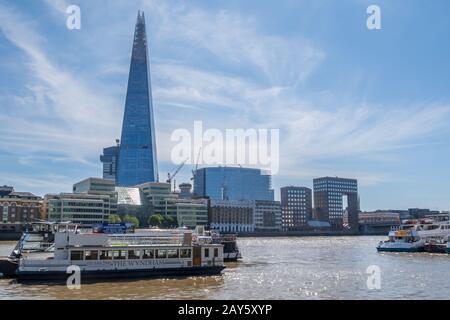 London, England -August 01 2018: Wyndham party boat moored on the River Thames in froint of the Shard skyscraper in the City of London, UK. Stock Photo