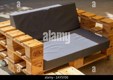 modern rustic solid wood furniture made from wooden pallets - Upcycling Stock Photo