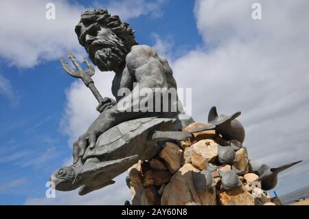 King Neptune Statue at the entrance of Neptune Park on the Virginia Beach boardwalk Stock Photo