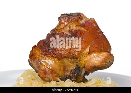 Bavarian knuckle of pork with sauerkraut Stock Photo