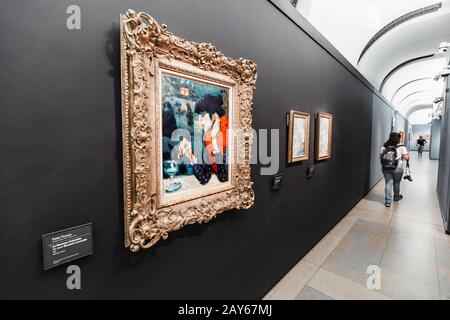 27 July 2019, Orsay museum, Paris, France: tourists visits famous museum with impressionist collection. Pablo picasso painting on a foreground Stock Photo