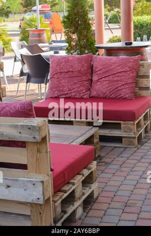Seating set made of Euro pallets - Upcycling solid wood furniture Stock Photo