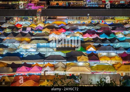 Night market high view of colorful tent retail shop and lighting in Ratchadapisek, Bangkok Thailand Stock Photo