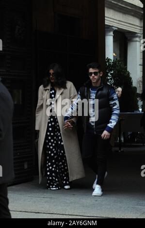 Milan, Italy. 14th Feb, 2020. Nick Jonas and wife Priyanka Chopra lunch in the center Nick Jonas, one of the 3 brothers of the famous musical group 'JONAS BROTHER' in concert this evening in Milan, surprised at lunch in a well-known restaurant in the center together with his wife Priyanka Chopra, actress model and Indian singer, winner of the beauty contest Miss World 2000, first Bollywood actress to have won 5 filmfare Awards in 5 different categories. In 2015 protagonist of the US TV series 'Quantico', and he is Goodwill Ambassador of UNICEF. Credit: Independent Photo Agency Srl/Alamy Live N Stock Photo
