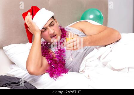 Man having hangover after night party Stock Photo