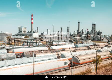 Fuel and chemical plant and industrial area with storage and railway tanks for transportation of liquids Stock Photo